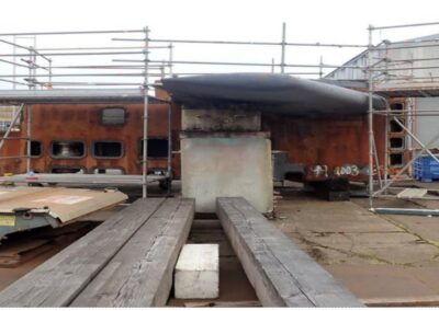 Lower portion of Sail Structure. Looking from the starboard side. Fairwater Planes still attached. They will be removed for separate transport.