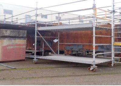 Lower portion of Sail Structure. Looking forward from port side. Fairwater Planes still attached. They will be removed for separate transport.