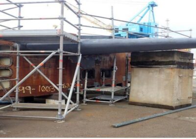 Lower portion of Sail Structure. Looking aft from the port side. Fairwater Planes still attached. They will be removed for separate transport.